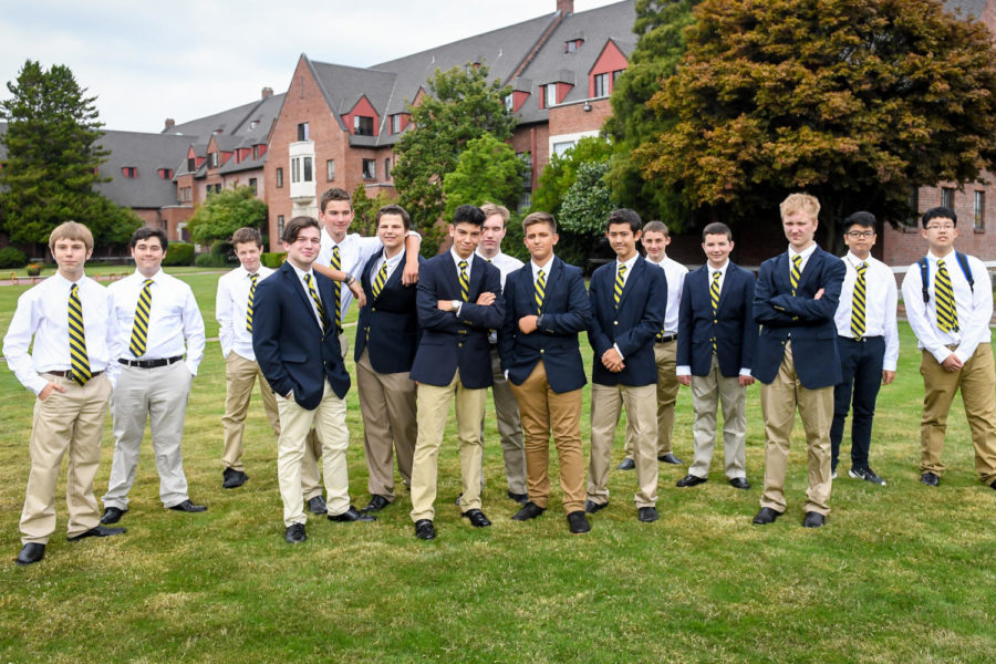 The Upper School boys stand at the site of where their new school will be built. Photo courtesy Oona Copperhill