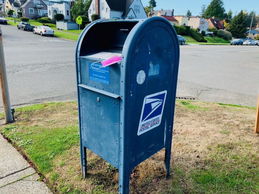 A mask lies on a USPS mailbox near Annie Wright Schools.