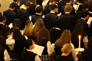 Students seen wearing dress uniform for Lessons and Carols tradition