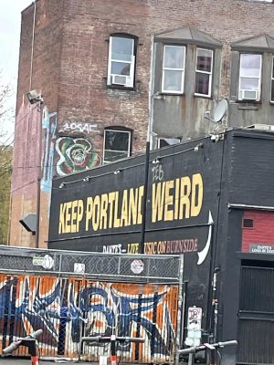 A “Keep Portland Weird” mural across from Voodoo Doughnuts.